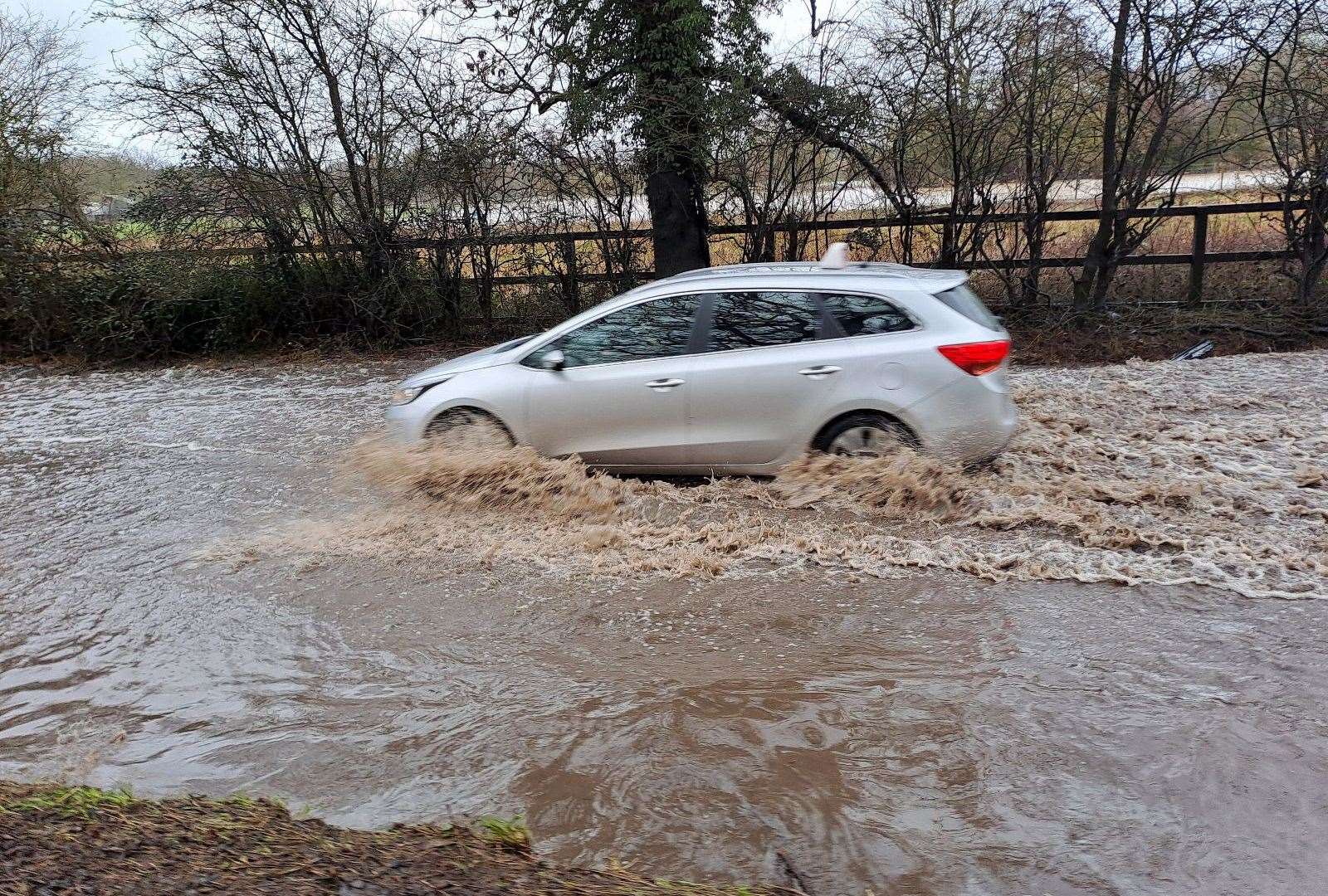 The A1088 between Elmswell and Norton is flooded. Picture: Ross Waldron