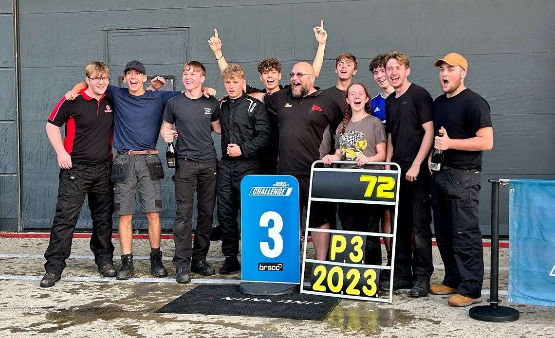 West Suffolk College students, driver and tutor celebrating their 3rd place position at Silverstone Circuit. Picture: The Pebble Agency @thepebble_agency