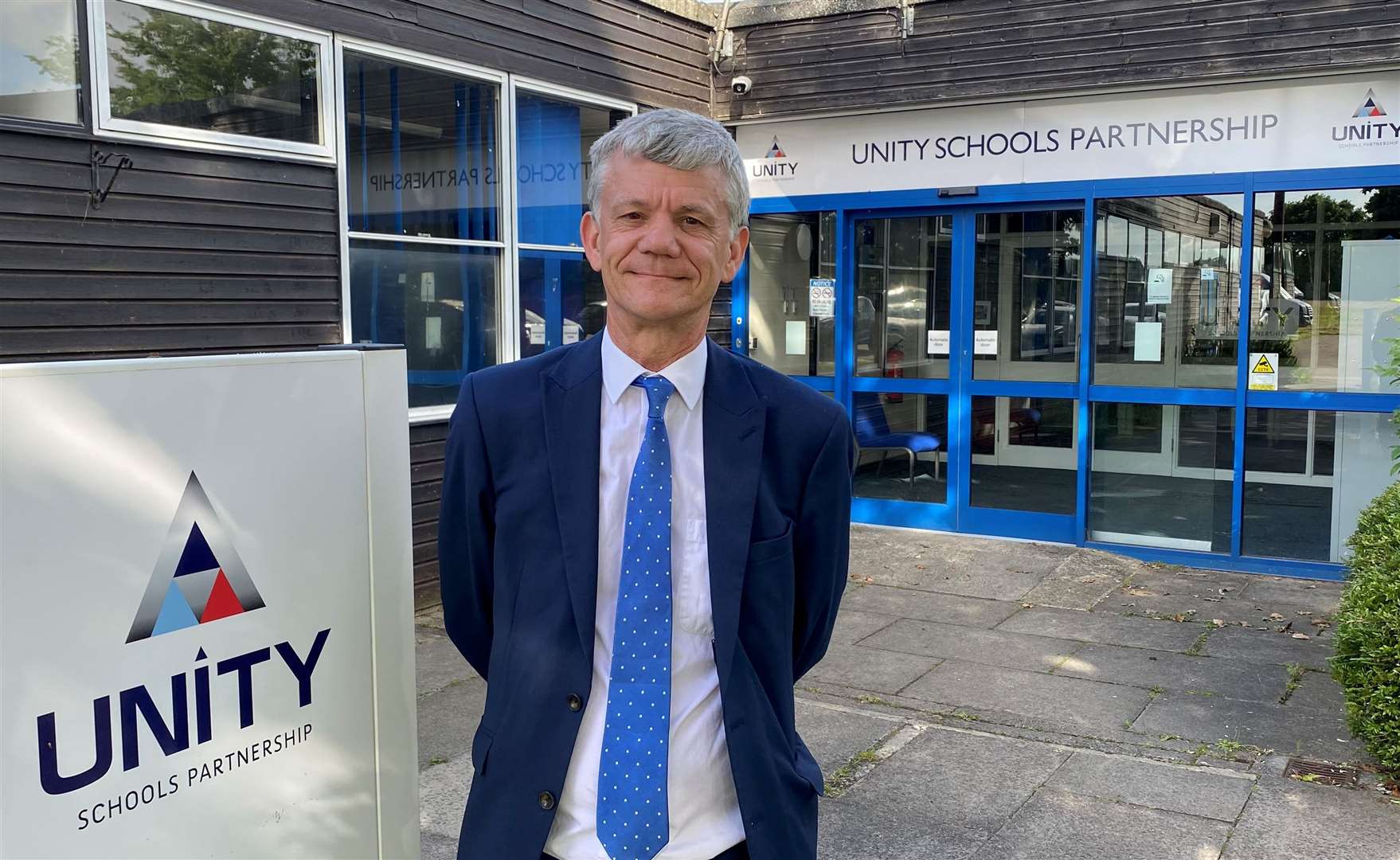 Dr Tim Coulson, chief executive officer of the Unity Schools Partnership outside its head office in Park Road, Haverhill. Picture: Gooderham PR