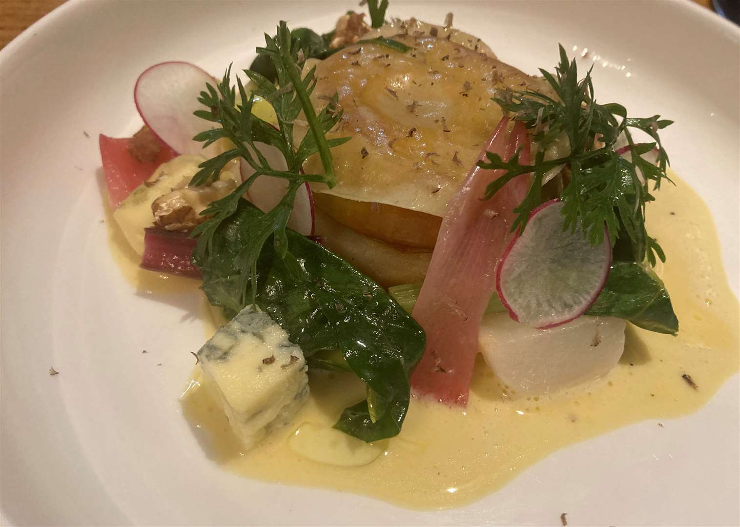 Celeriac and apple lasagna, blue chesse, walnuts and baby vegetables. Picture: Kev Hurst