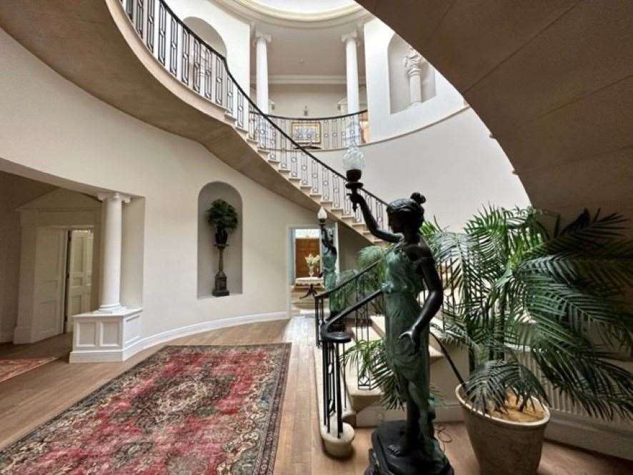 A view upward of the central staircase in Ashmans Hall. Picture: Auction House East Anglia.