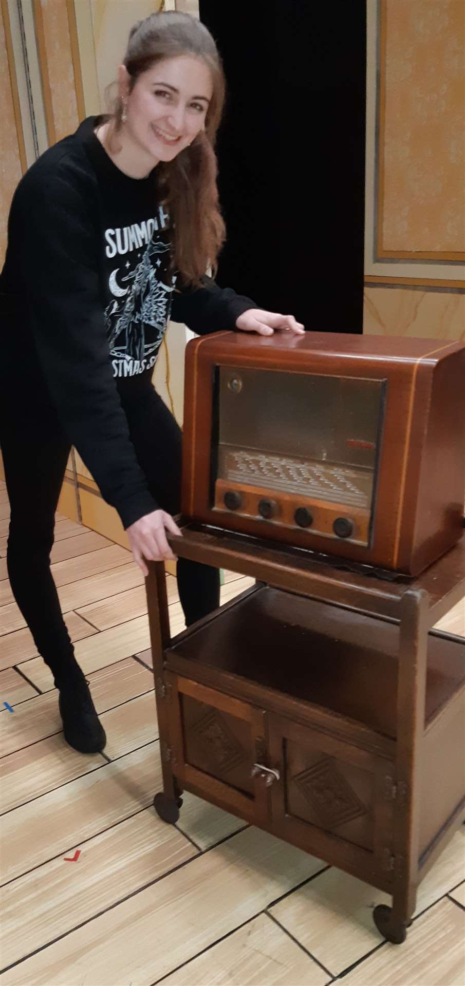 Tabitha Dodds, assistant stage manager for Snow White, with the vintage radio borrowed from her grandparents’ neighbour