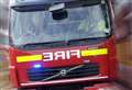 Firefighters from two counties battle garage blaze