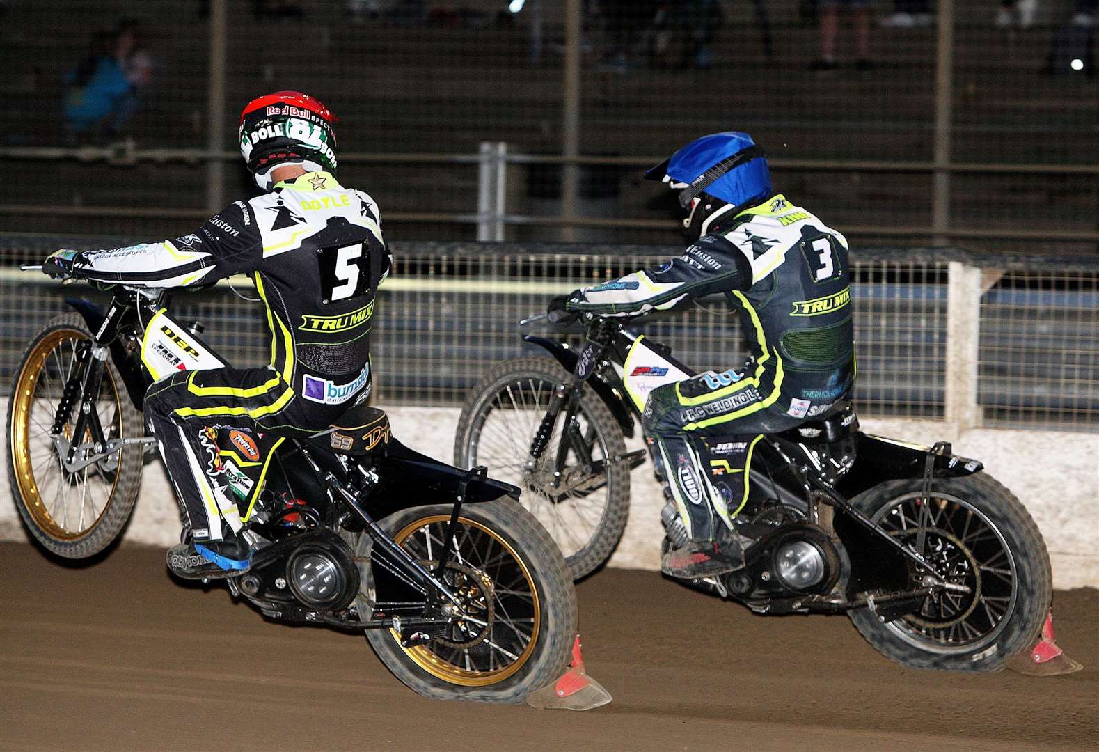 Jason Doyle, left, looks across at team-mate Danny King, as the pair race to a 5-1 last heat maximum against the Panthers last week. Picture: Phil Hilton