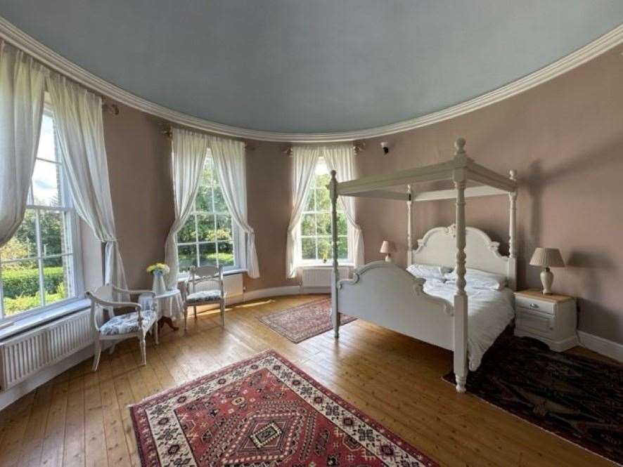 A curved-wall bedroom in Ashmans Hall. Picture: Auction House East Anglia.