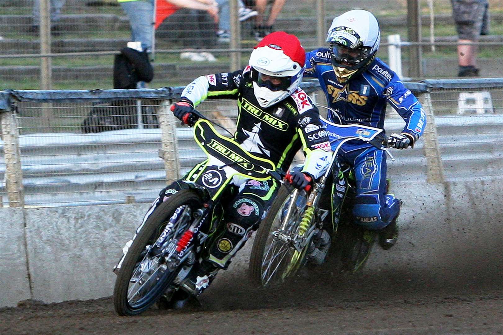 Emil Sayfutdinov broke the track record at Ipswich last week in this race where he leads fellow Russian Artem Laguta in heat one against King’s Lynn last Thursday. Picture: Phil Hilton