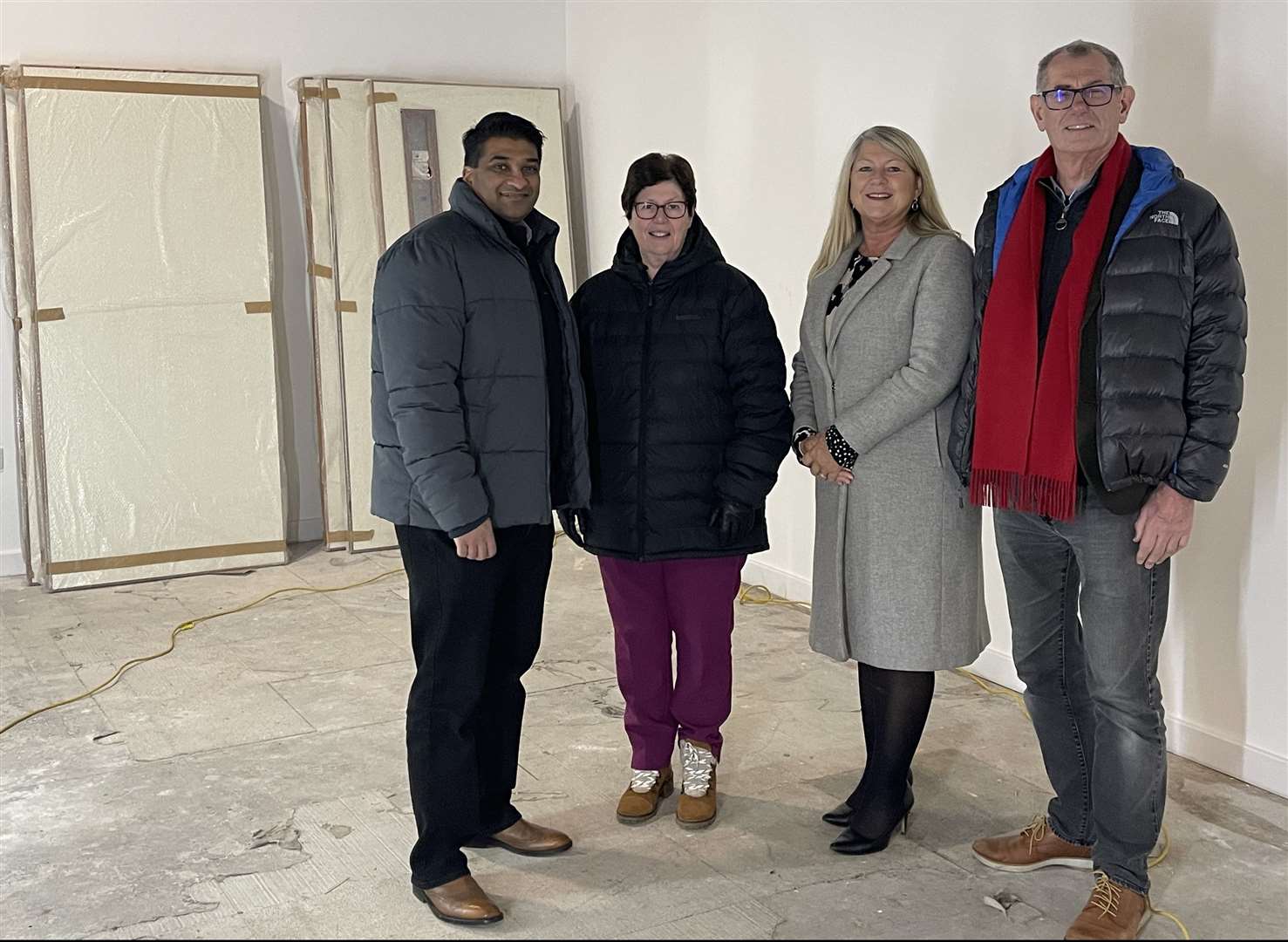West Suffolk councillors, from left: Indy Wijenayaka, Diane Hind and Cliff Waterman with Laraine Moody, from West Suffolk College inside Provincial House, where improvement work has been going on.Contributed picture