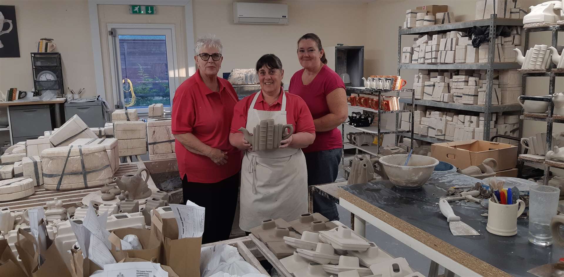 Pottery staff (L-R) Carol Bridges, Jil Davey and Tracey Maskell in the pottery at Carters of Suffolk
