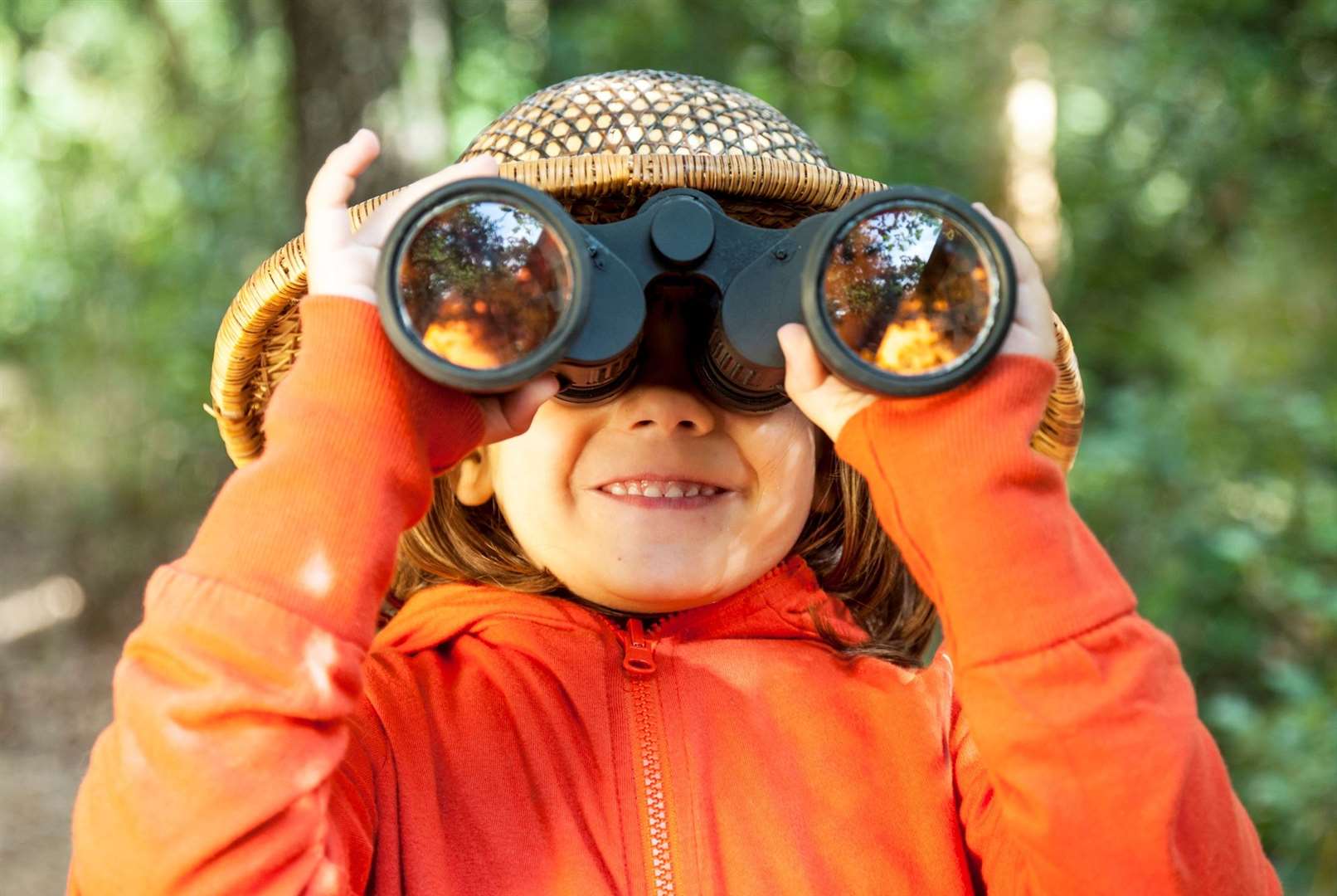 One young girl tries her hand at bird-watching.