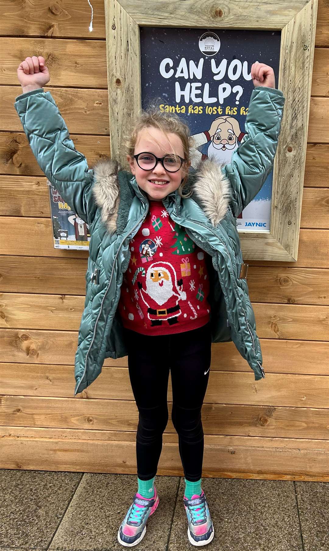 Clara, aged seven, enjoyed her trip to the Christmas Cabin on Saturday afternoon. Picture: Camille Berriman