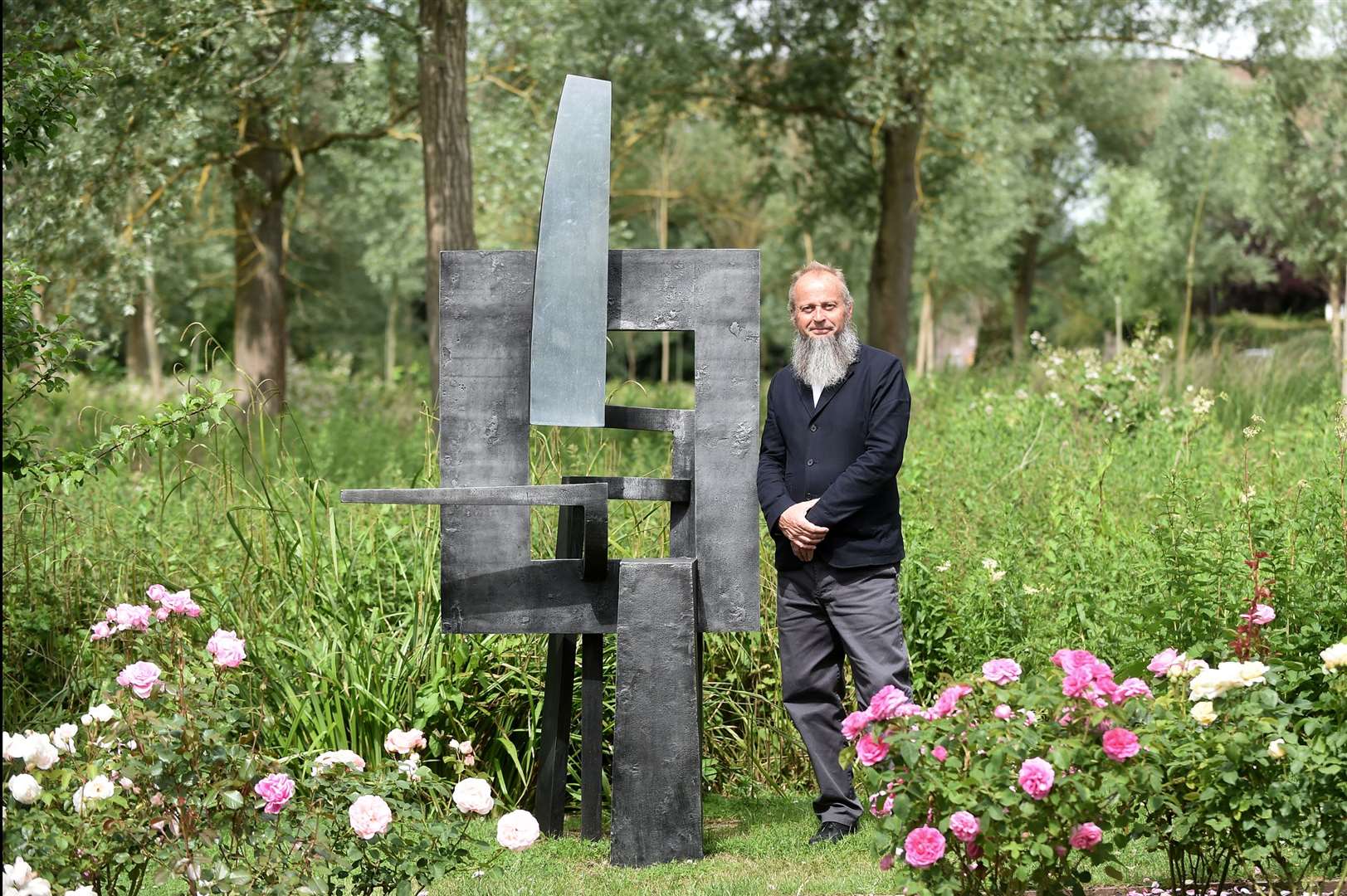 Chappel Galleries has reopened to the public after being closed during lockdown to showcase a coastal scenes watercolours exhibition with a range of sculptures...Pictured: Sculpter Jonathan Clarke with his piece 'Frame of Reference'...PICTURE: Mecha Morton... (37033043)