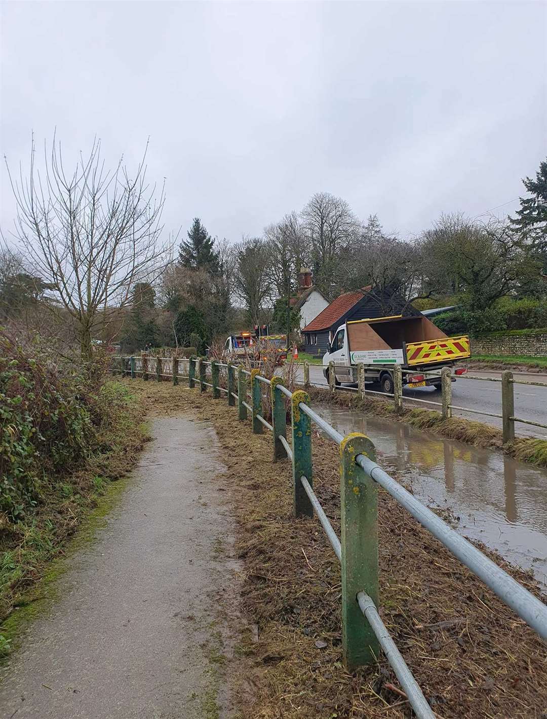 Water is visible by the side of Barking Road in Needham Market. Picture: Suffolk News