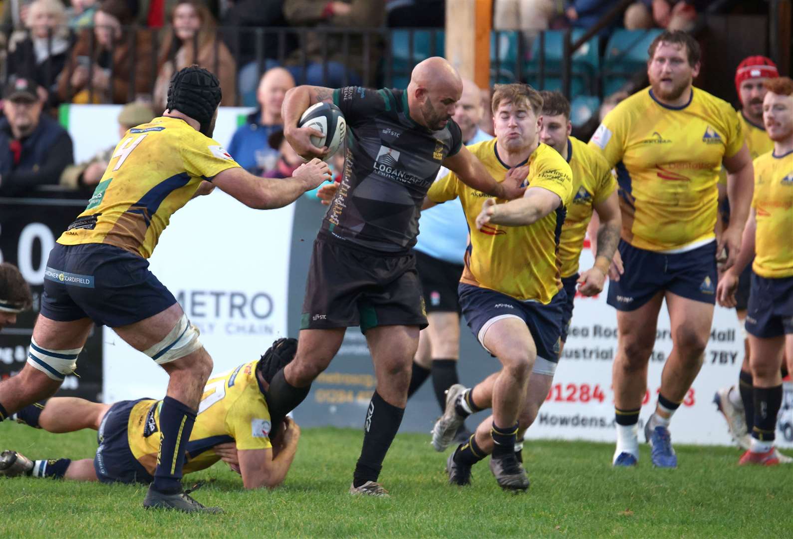 Try-scorer Shaq Meyers holds off a tackle on a surge through the Worthing defensive line Picture: Richard Marsham