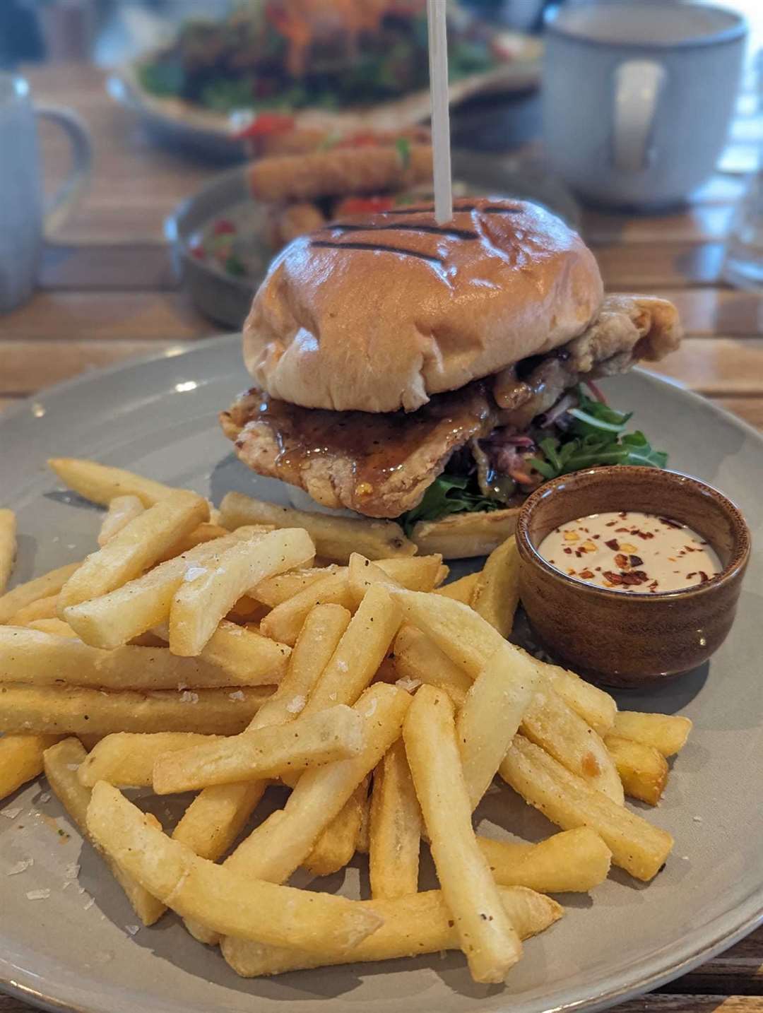 Sam chose the sticky chicken burger with fries - priced at £14.95. Picture: Suzanne Day
