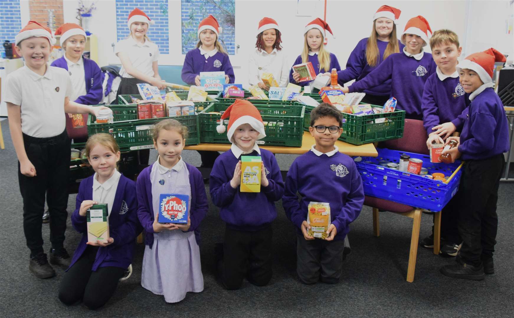 Children from the school's council with some of the donations which have been given. Picture: The Bishops CE Primary Academy