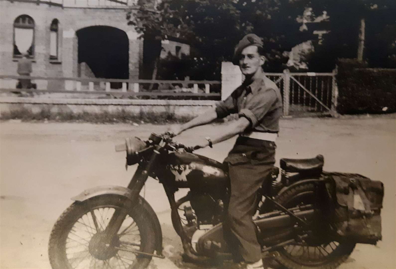 John Stokes on a borrowed motorbike during his army days