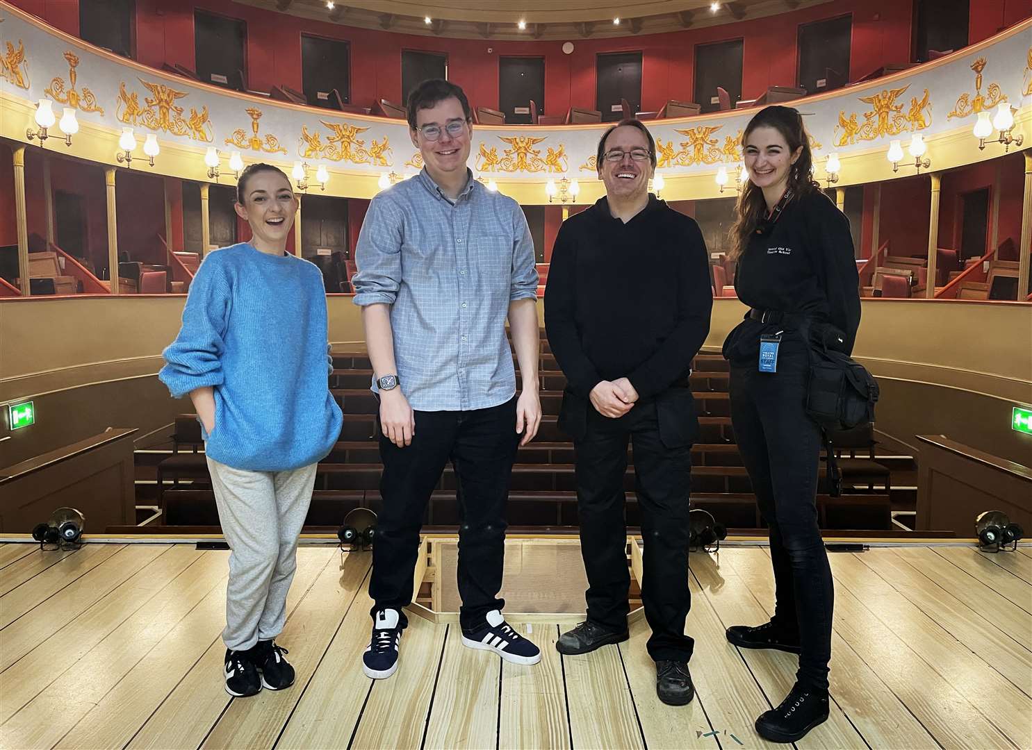 Left to right: Dance captain Lizzie Buckingham, musical director Ben Garnett, senior technician Chris Last and assistant stage manager Tabitha Dodds at the Theatre Royal, Bury St Edmunds